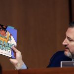 sen-ted-cruz-holds-up-a-book-on-antiracism-as-he-questions-news-photo-1648045886