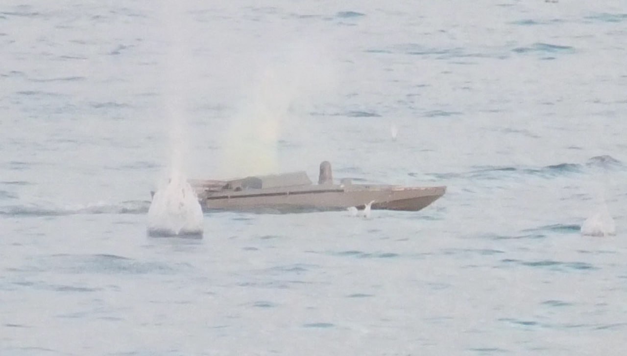 Still from the Russian Ministry of Defense video showing the impact of rounds around the drone. 