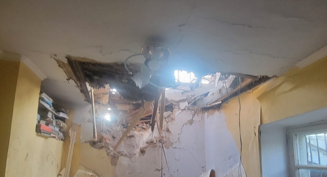 A hole in a residential home's ceiling caused by falling debris after a Russian missile was intercepted near Odessa. (Photo by Operational Command South)