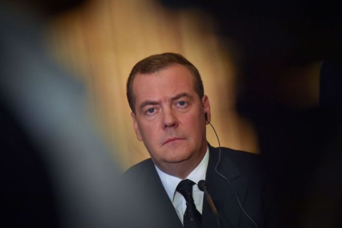 Then-Russian Prime Minister Dmitry Medvedev gives a press conference during an official visit to Le Havre, western France, on June 24, 2019. LOIC VENANCE/AFP/GETTY IMAGES